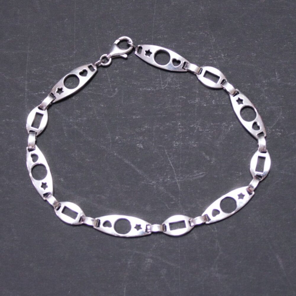 Vintage Silver Bracelet with Star and Circle Design